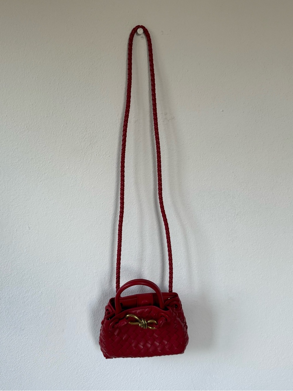 Red Woven Crossbody Bag with Gold Accent